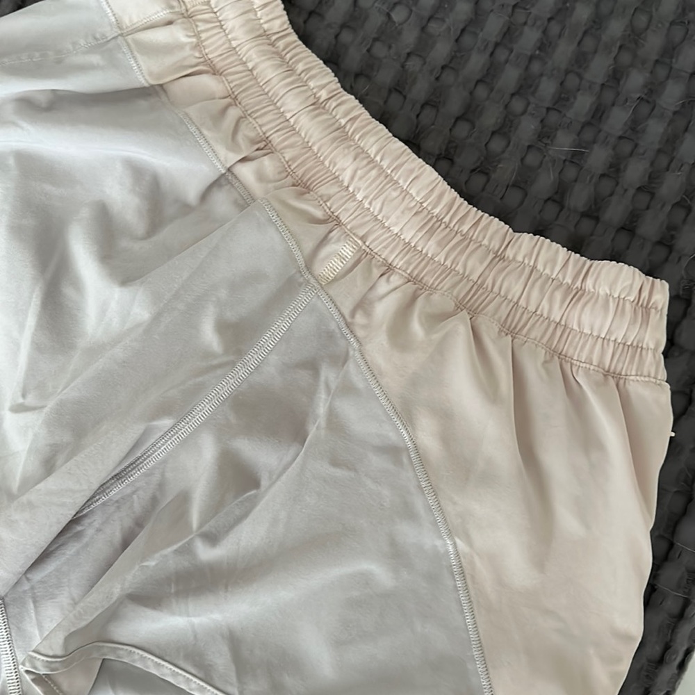 Lululemon | mid-rise pink/grey asymmetrical hotty hots 4”